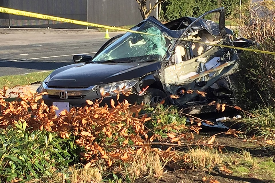 At least one person received life-threatening injuries when a car collided with a semi truck in South Surrey on Friday morning. (Brenda Anderson photo)