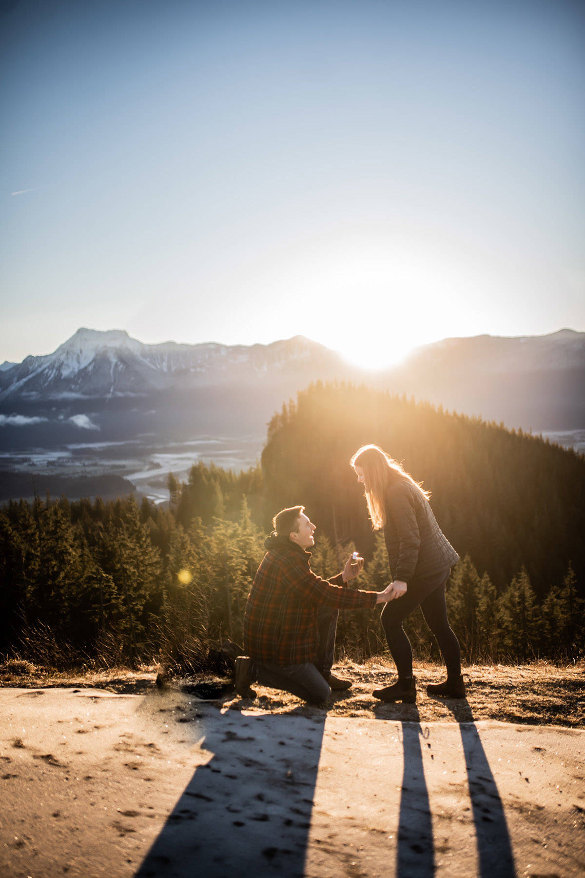 Johan Dekker shocked not just his girlfriend, Mallie Moore, when he proposed atop Mount Woodside, but also photographer Emily Peter who happened to be in the right place at the right time on Saturday, Dec. 12, 2020. (Emily Peter Photography)
