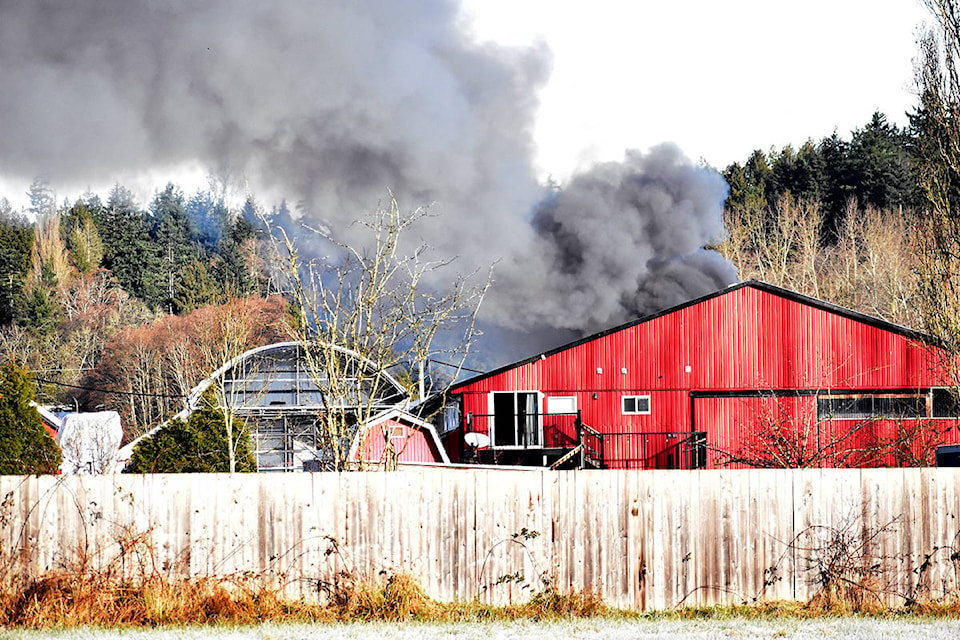 Black smoke is billowing from a South Surrey property this morning (Dec. 24). (Nick Greenizan photo)