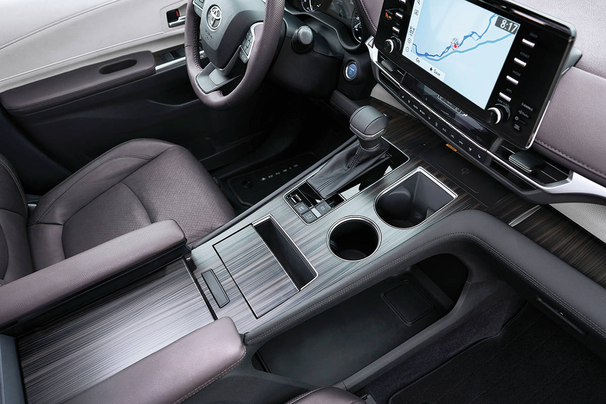 The Sienna has up to 18 cupholders although the two in the centre console might be the most important. The shift lever commands a continuously variable transmission. PHOTO: TOYOTA