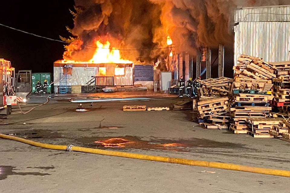 Township firefighters were called to battle a heavy blaze at a pallet factory in Glen Valley at 256 Street and 88 Avenue just after 11 p.m. on Thursday, Feb. 25, 2021. (Andy Hewitson/Special to Langley Advance Times)