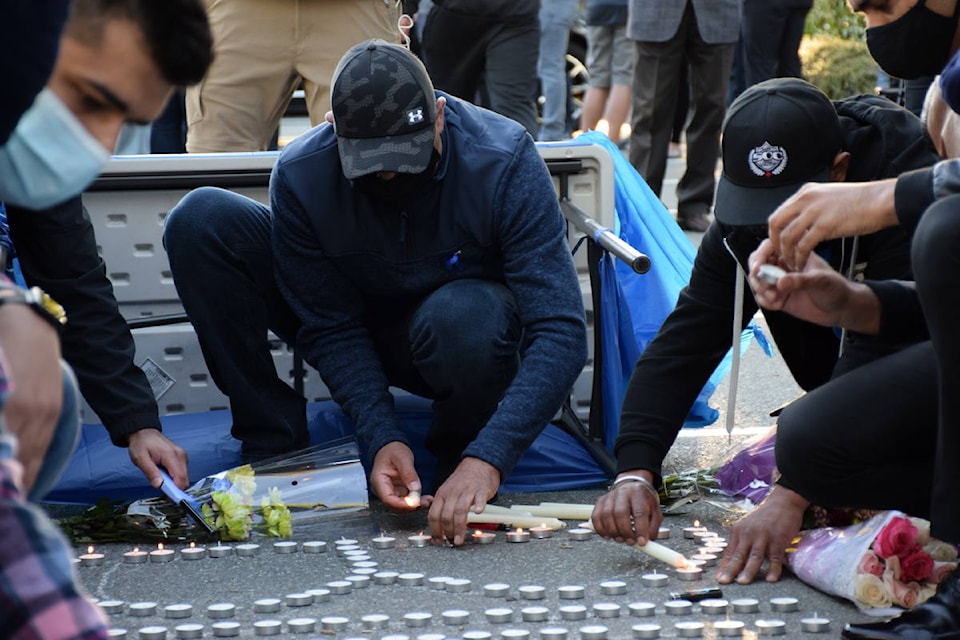 Hundreds gathered for a candlelight vigil Friday evening (May 7) to remember 29-year-old corrections officer Bikramdeep Randhawa, who was killed in last weekend’s brazen daylight shooting outside North Delta’s Scottsdale Centre mall. (James Smith photo)