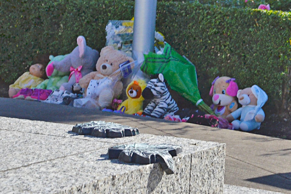 Metal maple leafs in the foreground are on the cenotaph in Douglas Park. Langley City has announced a memorial at the park to the 215 dead children whose bodies were buried on a Kamloops residential school site. (Heather Colpitts/Langley Advance Times)