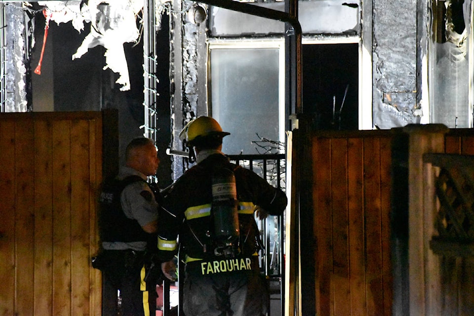 A Willoughby family was rescued from the roof of their home by firefighters early Monday morning. (Curtis Kreklau South Fraser News Services/special to Langley Advance Times)