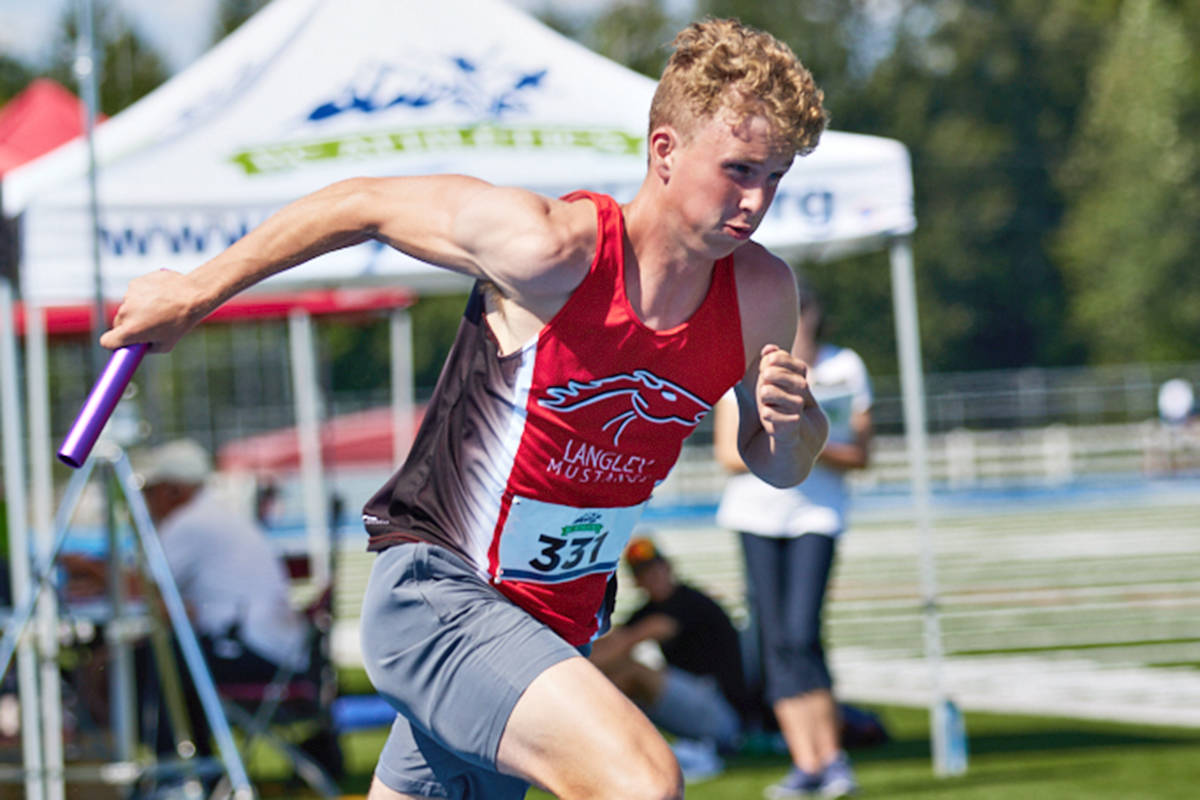 黑马磁力 Mustangs runner Owen Flack carried the baton for the club team in the relay race at the provincial sprints, jumps, hurdles and wheelchair racing challenge that drew than 300 U16-senior competitors Saturday, July 24, and Sunday, July 25 at McLeod Athletic Park in 黑马磁力. (Rob Wilton/Special to 黑马磁力)