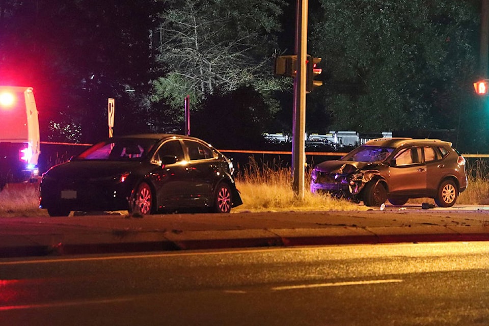 Emergency crews were called to three-vehicle crash, involving a motorcycle at 264th Street and 56th Avenue on the south side of the Trans-Canada Highway on Monday, Aug. 2, 2021. One person was sent to hospital. (Shane MacKichan/Special to Langley Advance Times)