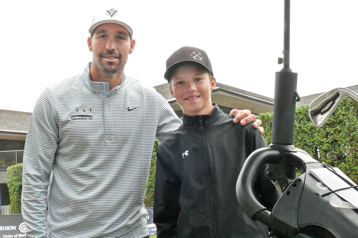 Amateur Lee Brandt and son Joey, his caddy, at the start of the Modern Meat open at Newlands Golf and Country Club in 91原创 on Saturday, Aug. 7. (Dan Ferguson/91原创 Advance Times)