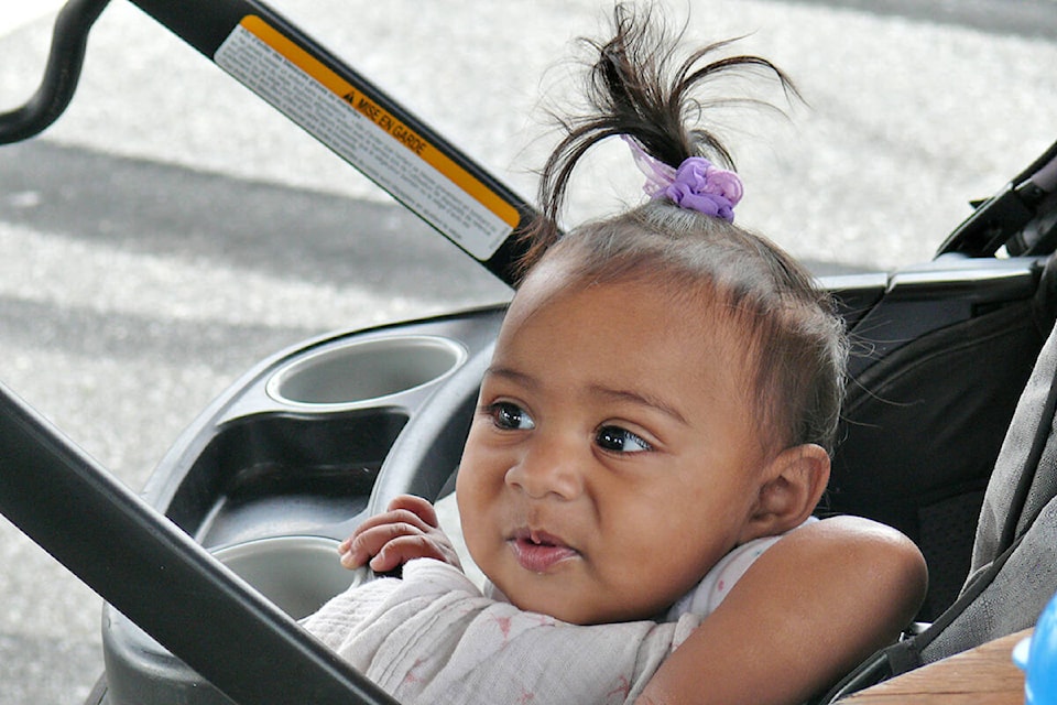 At 10 months, Adishri from Willoughby was among the youngest visitors to the Langley Food Truck Festival on Saturday, Sept. 4. (Dan Ferguson/Langley Advance Times)