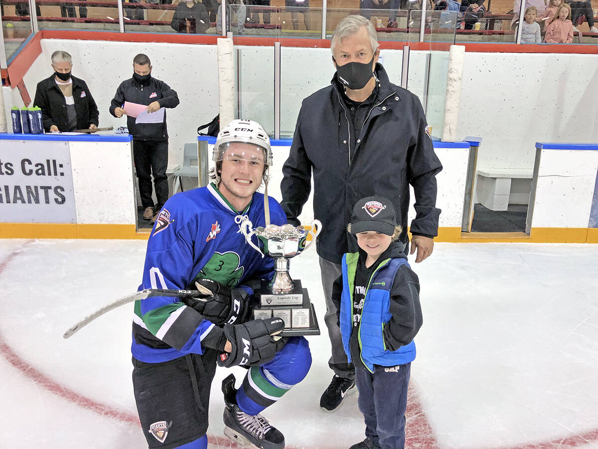 Vancouver Giants forward Zack Ostapchuk shows off the newly-won Legends Cup with Giants Senior Vice-President Dale Saip and his grandson Casey Dyck Monday, Sept. 6, at the Ladner Leisure Centre. (Special to Langley Advance Times)