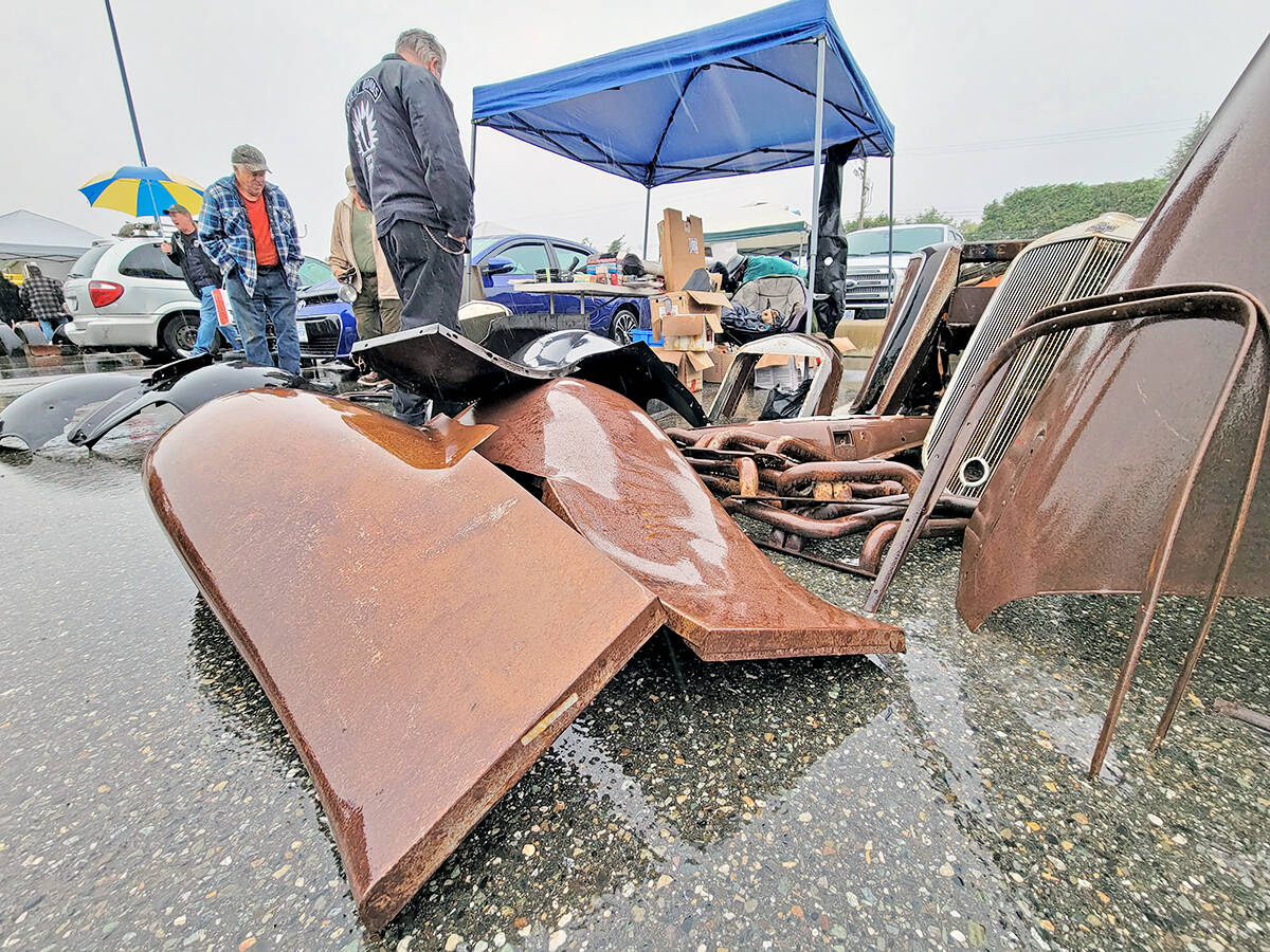 Rain was pouring down as the Good Times Cruise-In swap meet and car corral got underway in the parking lot of the Aldergrove Community Secondary School at 26850 29th Avenue on Sunday morning, Sept. 12. (Dan Ferguson/91ԭ Advance Times)
