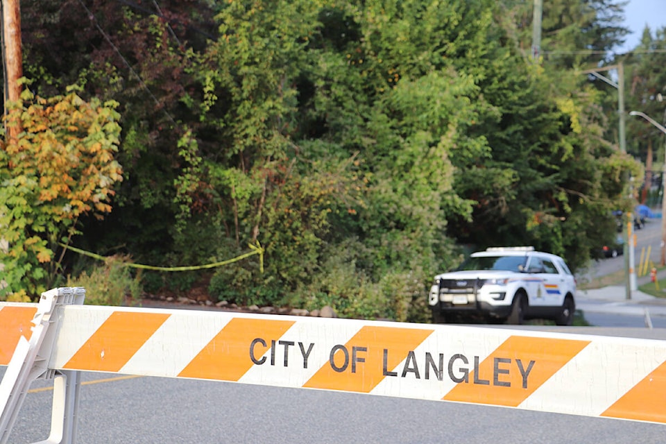 Naomi Onotera’s home was behind police tape Tuesday morning, Sept. 14, 2021. (Joti Grewal/Langley Advance Times)