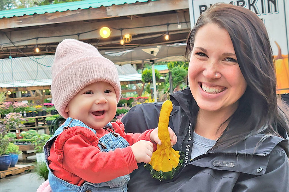 Walker, 10-month-old, and mom Katey Kloepper, from Calgary, were among the visitors to Art’s Nursery scarecrow stroll and fundraiser, which is on till Oct. 31 at 8940 192nd St. (Dan Ferguson/Langley Advance Times)