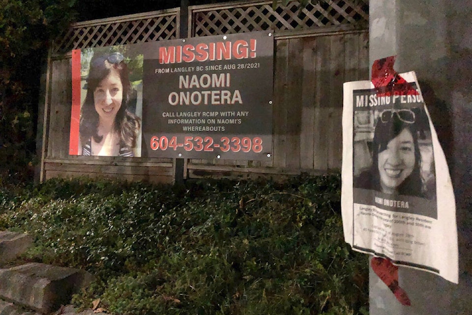 A sign appealing for help faces the home of missing 91ԭ City woman Naomi Onotera. (91ԭ Advance Times files)