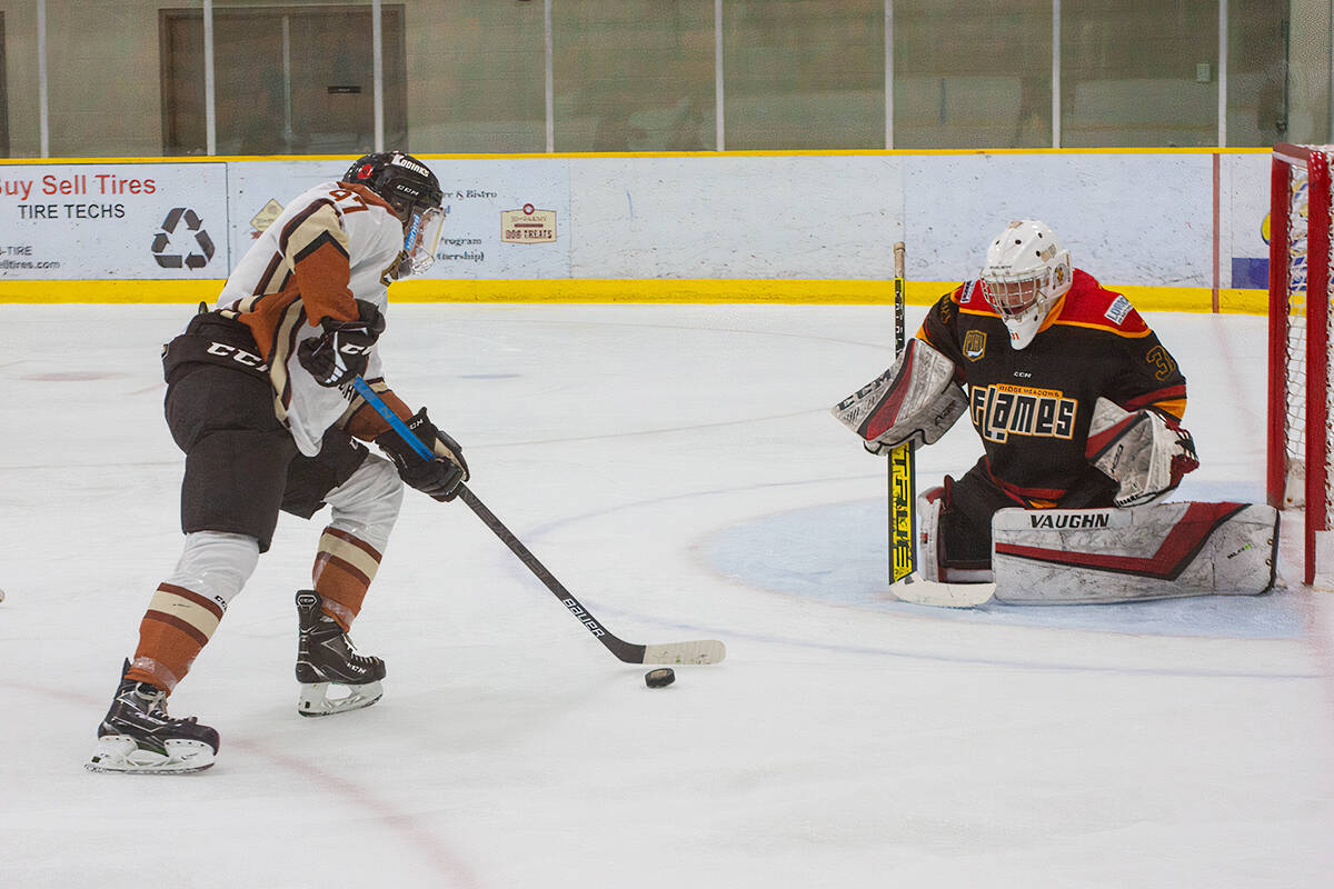 Aldergrove Kodiaks Carson Preston challenged the Ridge Meadows Flames goalie. Kodiaks won 3-2 at Aldergrove Credit Union Community Arena on Nov. 3. (Kurt Langmann/Special to 91Ô´´ Advance Times)