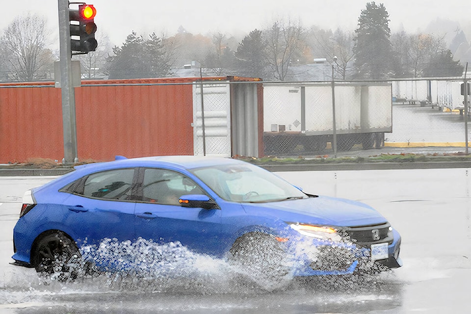 27176103_web1_211114-LAT-DF-flooding-200-91A_1