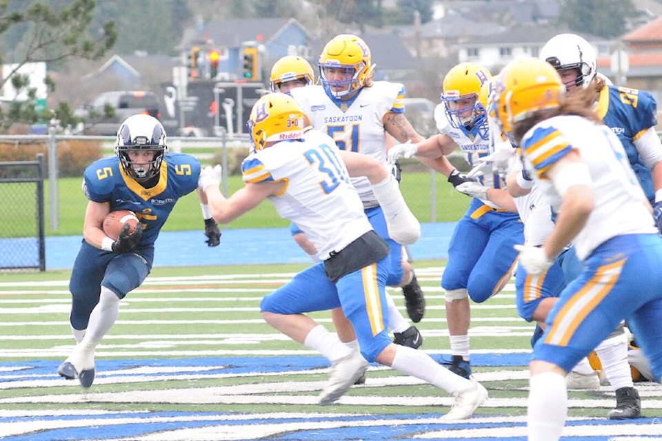 Joel Klaassen ran the ball for the Rams as Langley downed the Saskatoon Hilltops 17-14 Saturday, Nov. 20 at McLeod stadium (Dan Ferguson/Langley Advance Times)