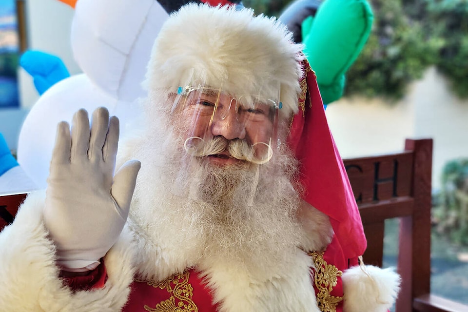 The jolly old elf was wearing a face shield at Aldergrove’s Shortreed school breakfast with Santa on Wednesday, Dec. 8. (Dan Ferguson/Langley Advance Times)