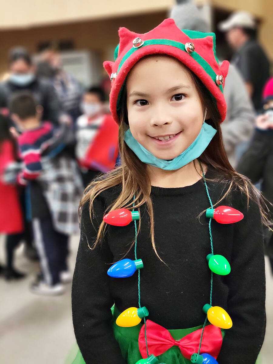 Ava Fossettedressed up as an elf, with her own lights for the Aldergrove Elks children聮s 27th annual Christmas party on Saturday, Dec. 11. (Dan Ferguson/91原创 Advance Times)