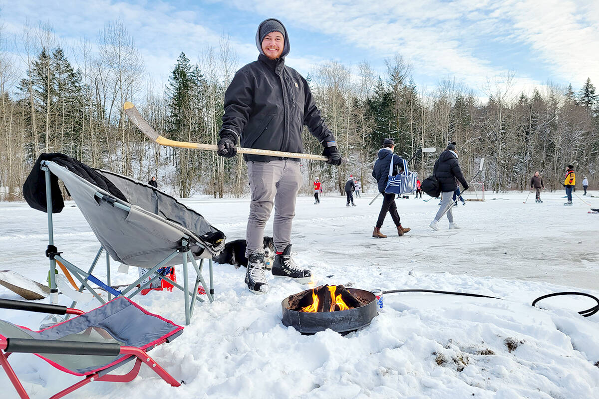 Brookswood resident Matthew Stewart and some friends played hockey at Dale Ball Passive Park on Monday, Dec. 27, when temperatures hit a record low. (Dan Ferguson/91原创 Advance Times)