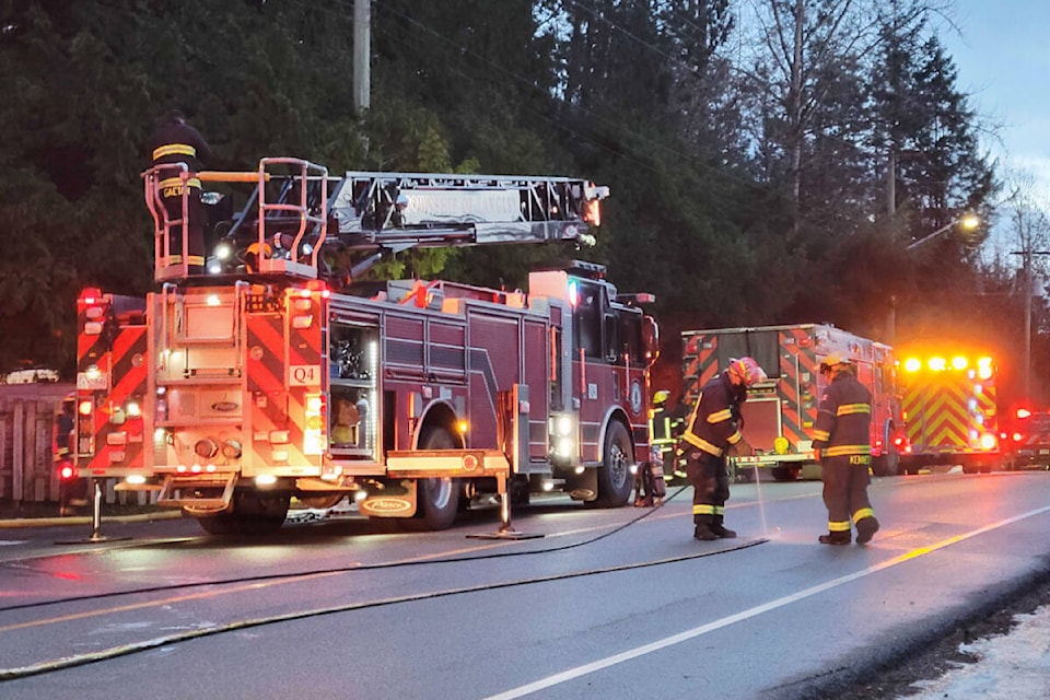 Firefighters on the scene of a house fire in the 2000 block of 200th Street on Jan. 3, 2022. (Dan Ferguson/Langley Advance Times)