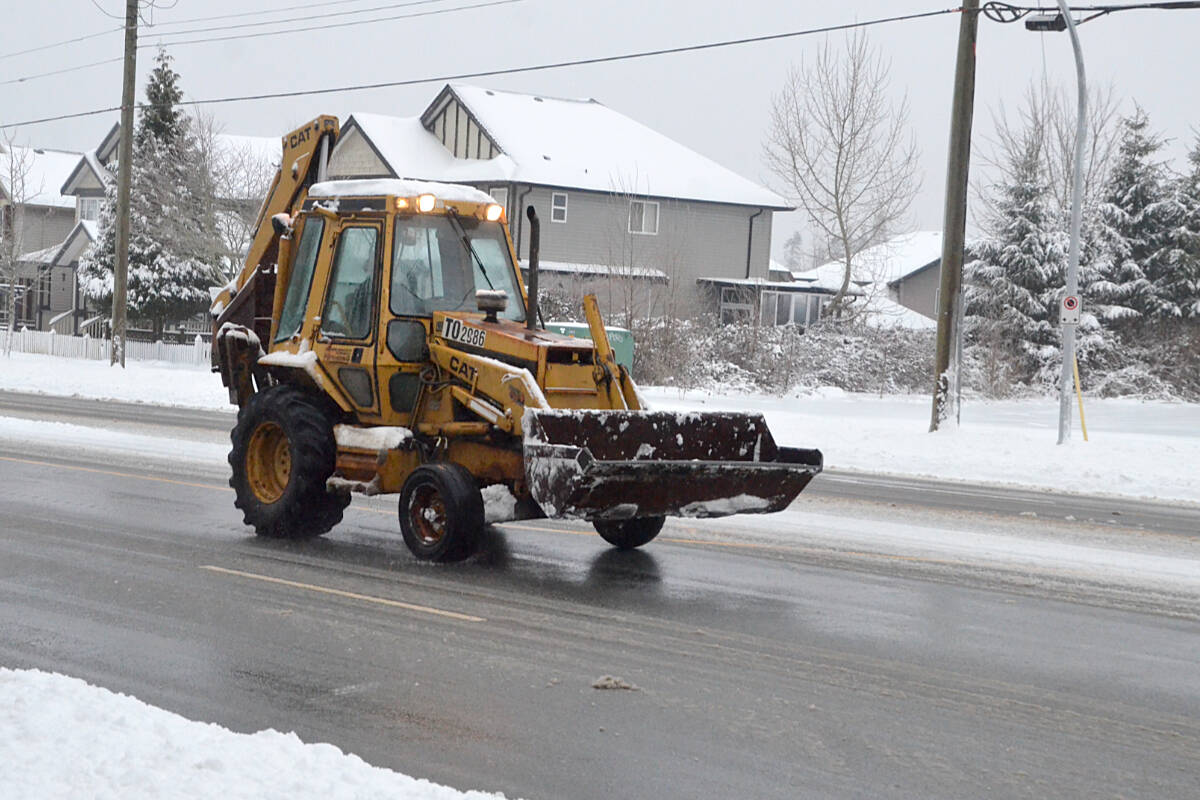 27741089_web1_220106-LAT-SnowPlow