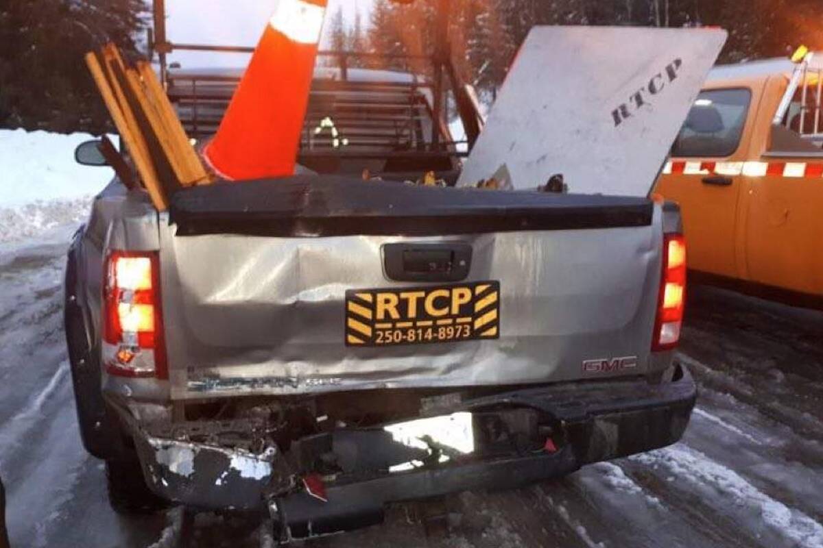 Emcon Services truck hit in crash.