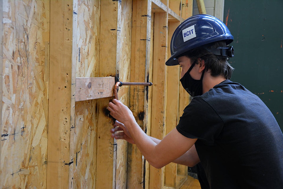 Student is installing copper water lines in the Piping Program at Langley Secondary School. (Special to Langley Advance Times)