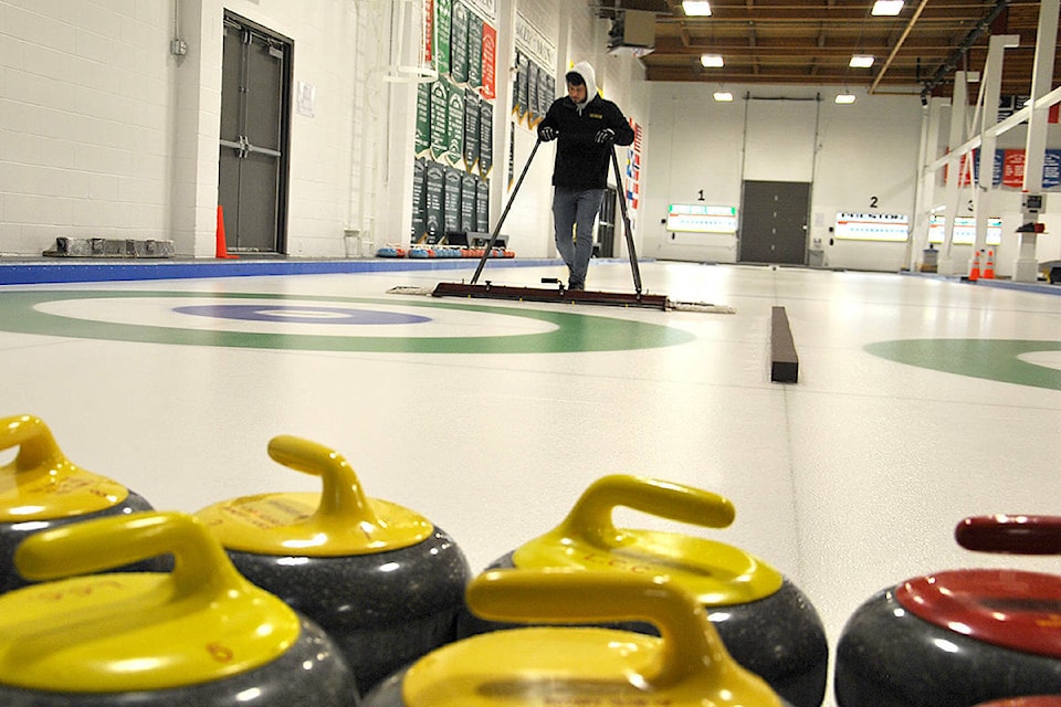 27938587_web1_220225-LAT-DF-curling-wrap-file_1