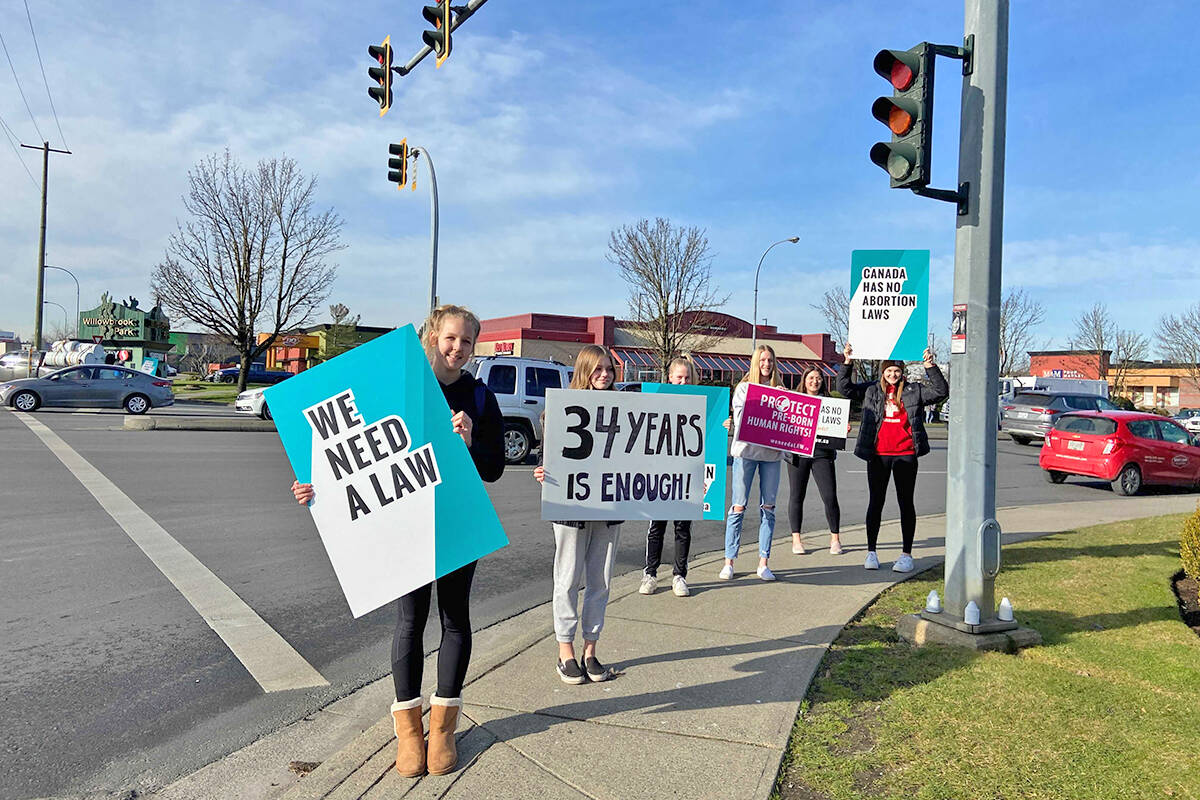 More than three dozen people marked the 34th anniversary of the court decision that struck down Canada聮s abortion law with a protest in 91原创 at the intersection of Fraser Hwy. and 200th St. on on Friday, Jan. 28. (Special to 91原创 Advance Times)