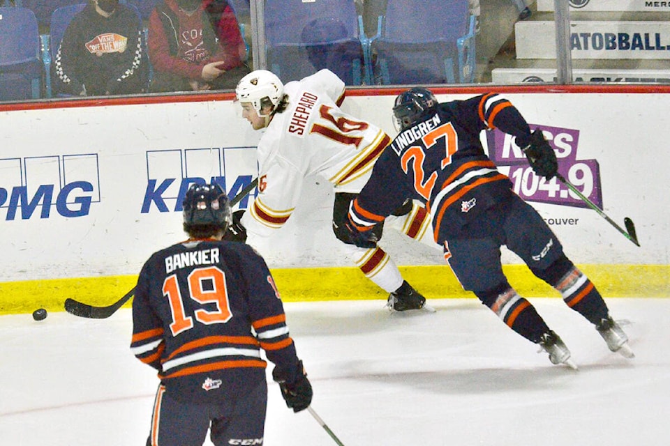 Cole Shepard tangled with two Blazers Friday, Feb. 4 at Langley Events Centre as the Kamloops team won 3-2. (Gary Ahuja, Langley Events Centre/Special to Langley Advance Times)