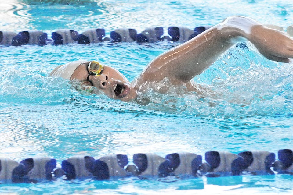 Langley Olympians Swim Club member Ian Cho won gold in the 100m freestyle, silver medal in the 200m freestyle with and bronze in the 50m butterfly at the Lower Mainland Regional East Championship Swim Meet hosted by LOSC at the Walnut Grove rec centre on Sunday, Feb. 7. It was the first big in-person meet for the club since the pandemic hit. (Dan Ferguson/Langley Advance Times)