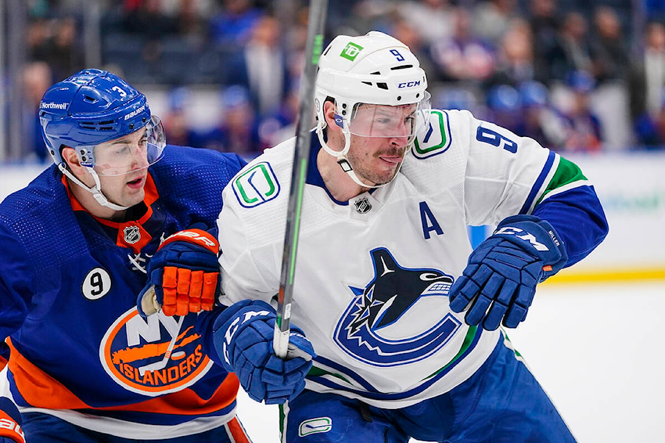 28353290_web1_220303-CPW-Canucks-Islanders-miller_1