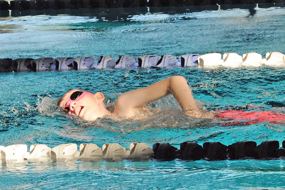 Langley Olympians Swim Club member Mika Kang competed in the 8 and under category, among 100 young swimmers from Langley, Abbotsford and Coquitlam who took part in the LOSC and AOSC novice meet at the Walnut Grove pool on Saturday, March 5. (Dan Ferguson/Langley Advance Times)