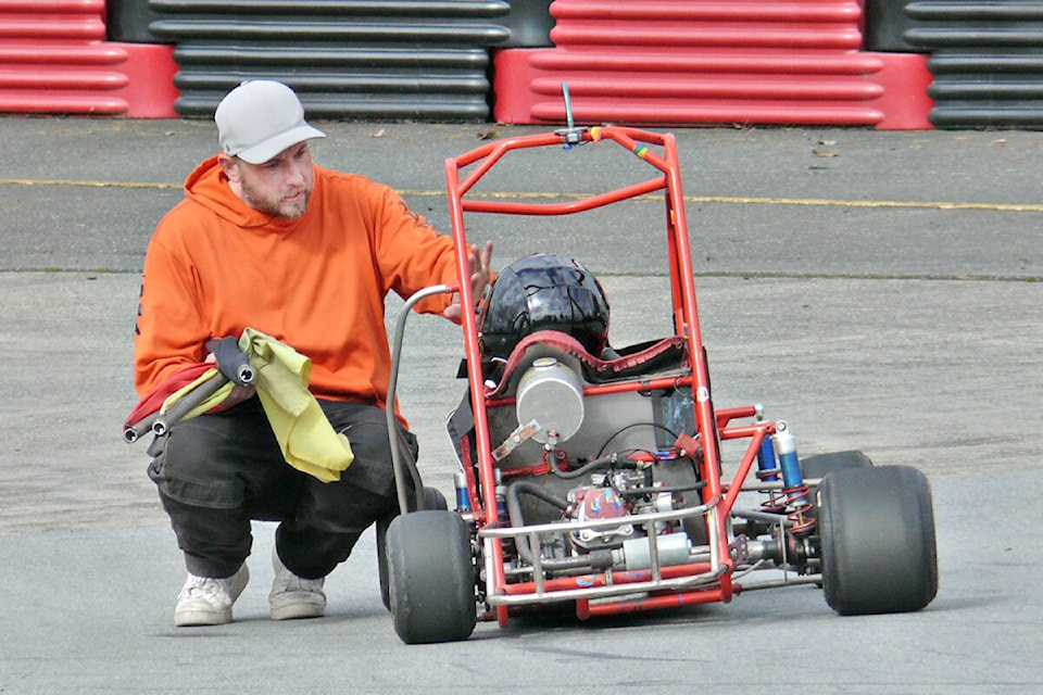 Joe Catton, better known as ‘Coach Joe’ instructs a young racer at 91ԭ Quarter Midget Association track in Aldergrove on Sunday, March 13. (Dan Ferguson/91ԭ Advance Times)
