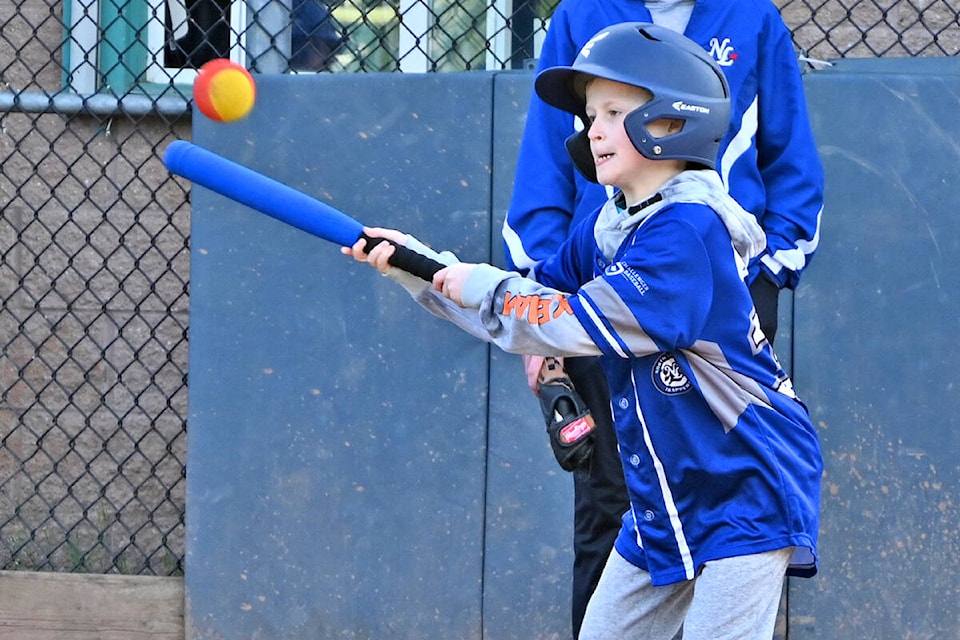 Colton Kenna at the bat during the Challenger Baseball season opener at Zarrelli Diamond in Walnut Grove on Saturday, April 9. (Jhim Burwell/Special to Langley Advance Times)