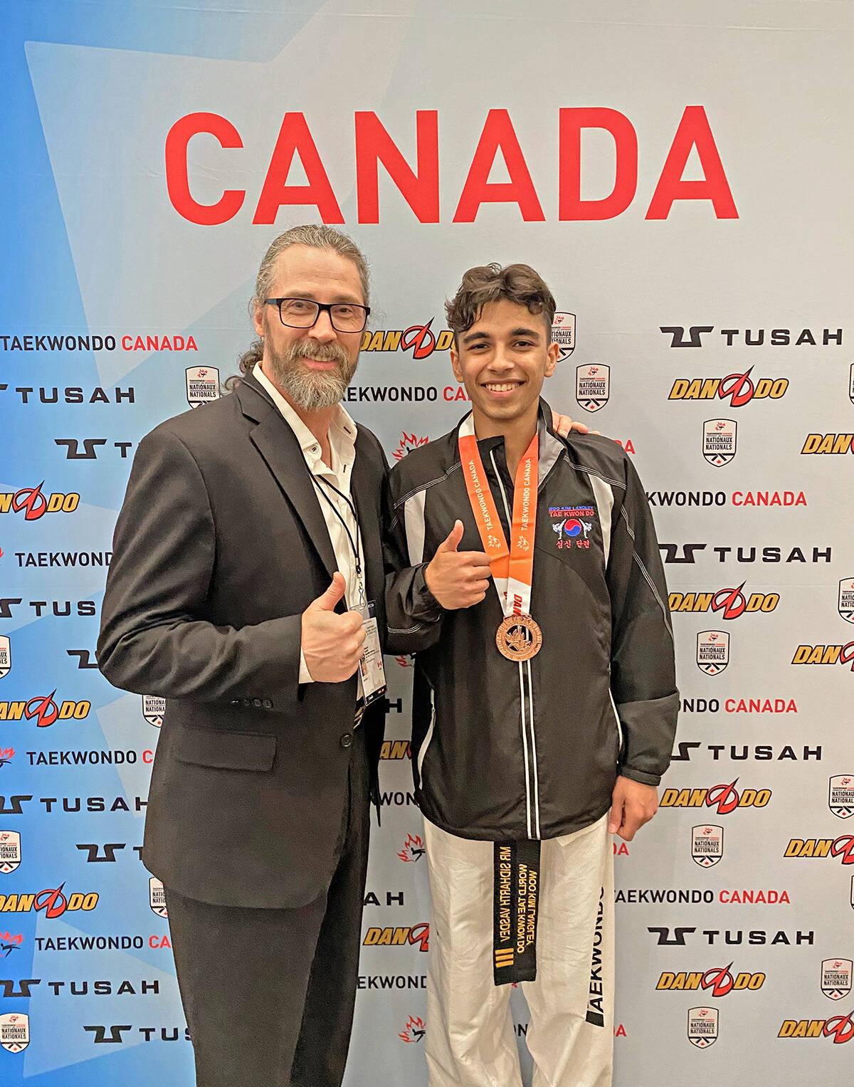 91原创聮s Woo Kim master Gary McLaughlin, with Sidhaarth Vasdev who won bronze at the 2022 Canadian National Championships. (Special to 91原创 Advance Times)