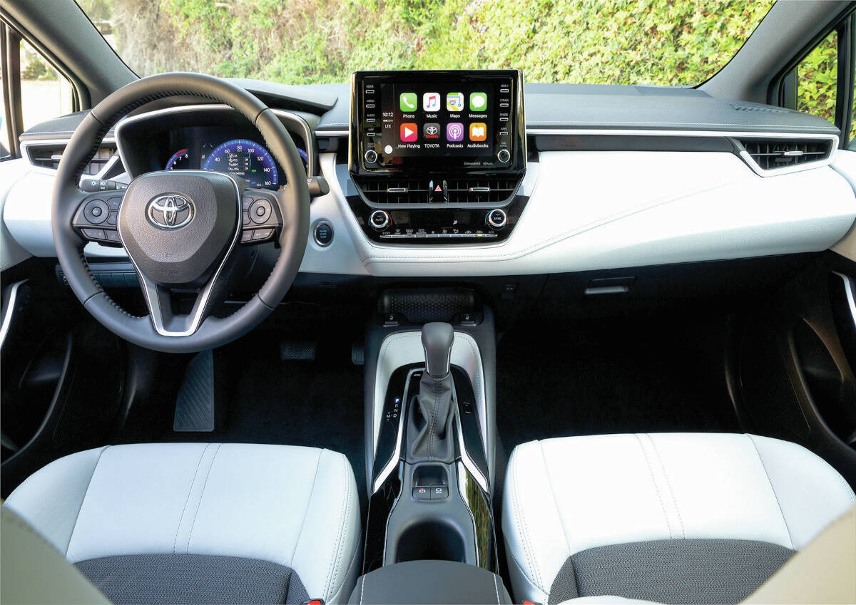 ItÂ’s tidy and upscale inside the Corolla. The optional 7.0-inch touch-screen dominates the dashboard and most other buttons are located on the steering wheel. PHOTO: TOYOTA