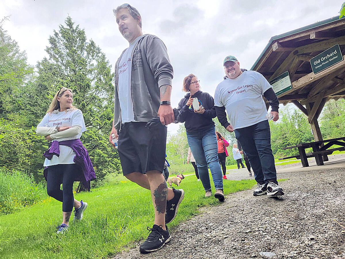About 50 people took part in the first annual Seamus Stroll in Campbell Valley Regional Park on Sunday, June 5, to raise funds for the 91ԭ Foundry facility for youth mental health. It was organized by Seamus dad, Mike (right). (Dan Ferguson/91ԭ Advance Times)