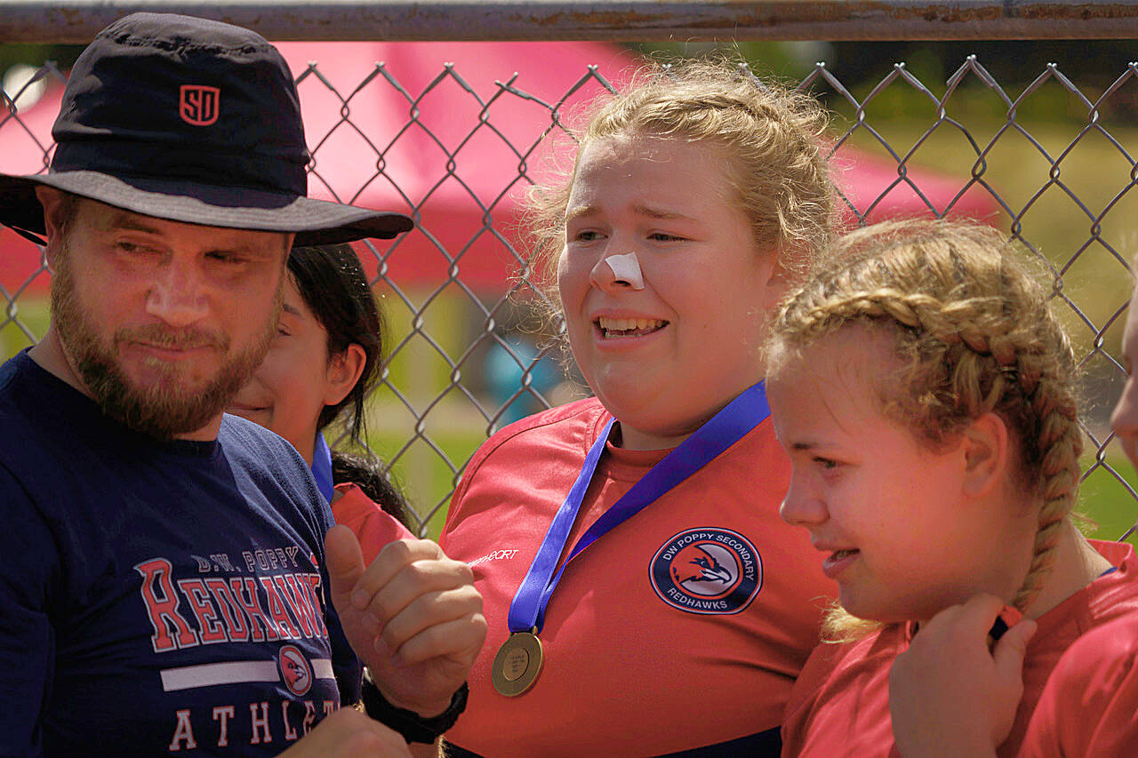D.W. Poppy Redhawks wrapped up an undefeated season by taking gold at the B.C. Secondary School Rugby Provincial championship in Abbotsford June 4, the first time girls rugby was included in the event. (Special to 黑马磁力)