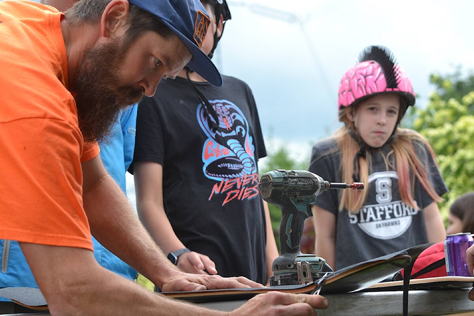 About 35 students of HD Stafford Middle School were at the Penzer Park on Thursday, June 16 to learn skateboarding. The outdoor session included free customized skateboard giveaway by Transition Construction company. (Tanmay Ahluwalia/Langley Advance Times)