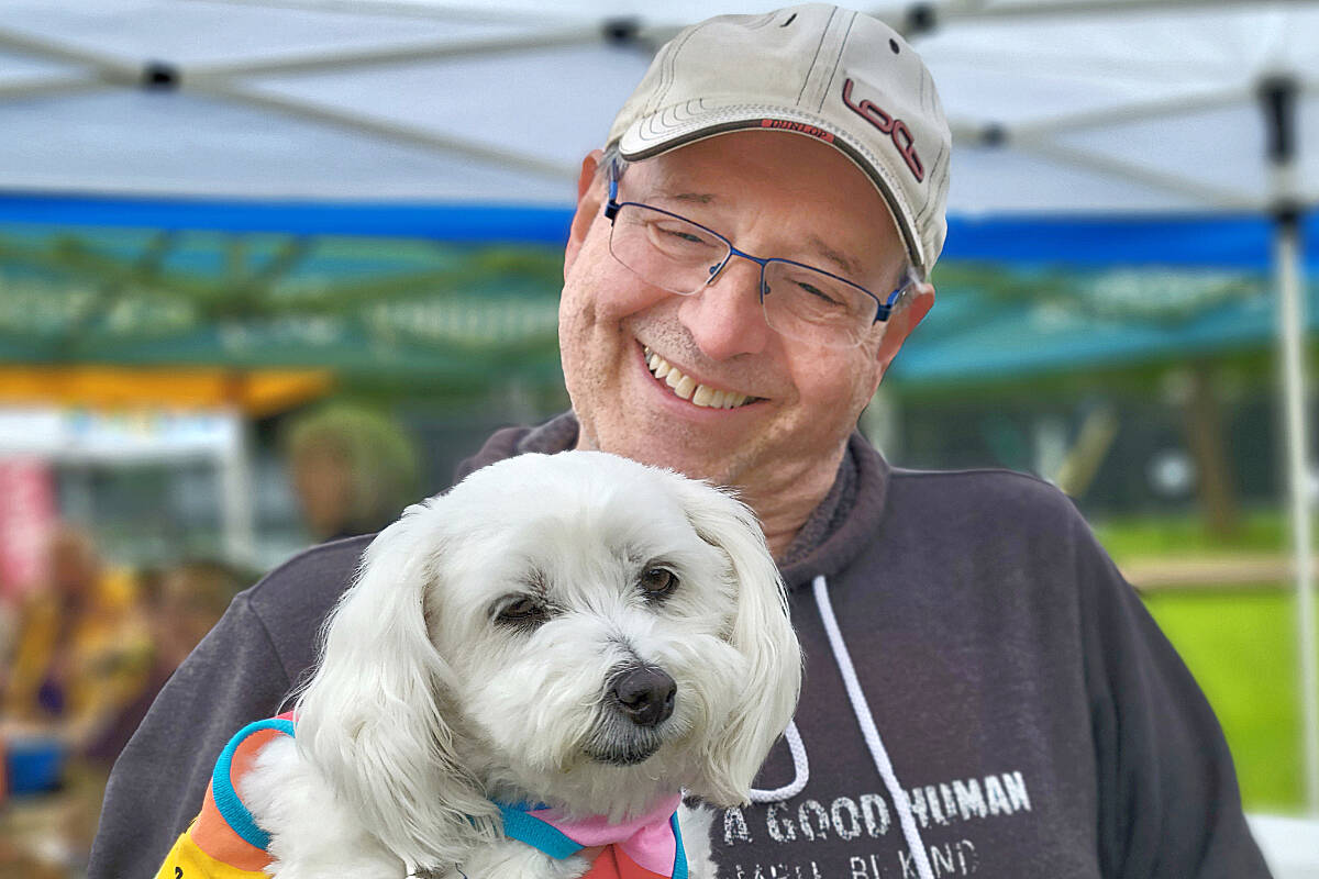Brookswood resident Bob Schwartz and dog Evelyn dropped by the LAPS booth at 91原创 City Community Day, on Saturday, June 18. (Dan Ferguson/91原创 Advance Times)