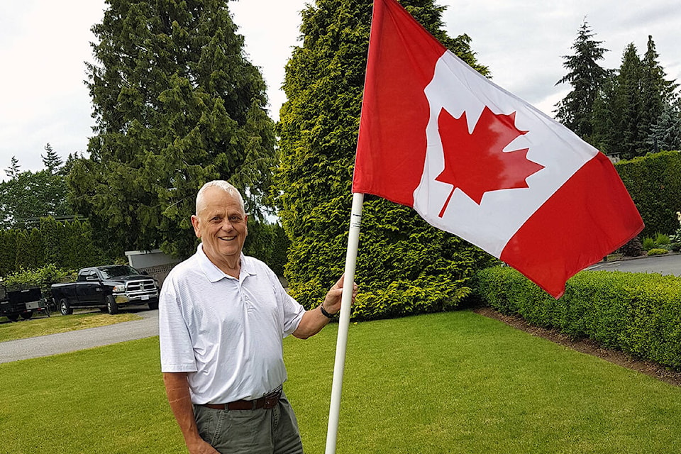 29568791_web1_220624-LAT-TA-CanadaDayRotaryFlag-_2