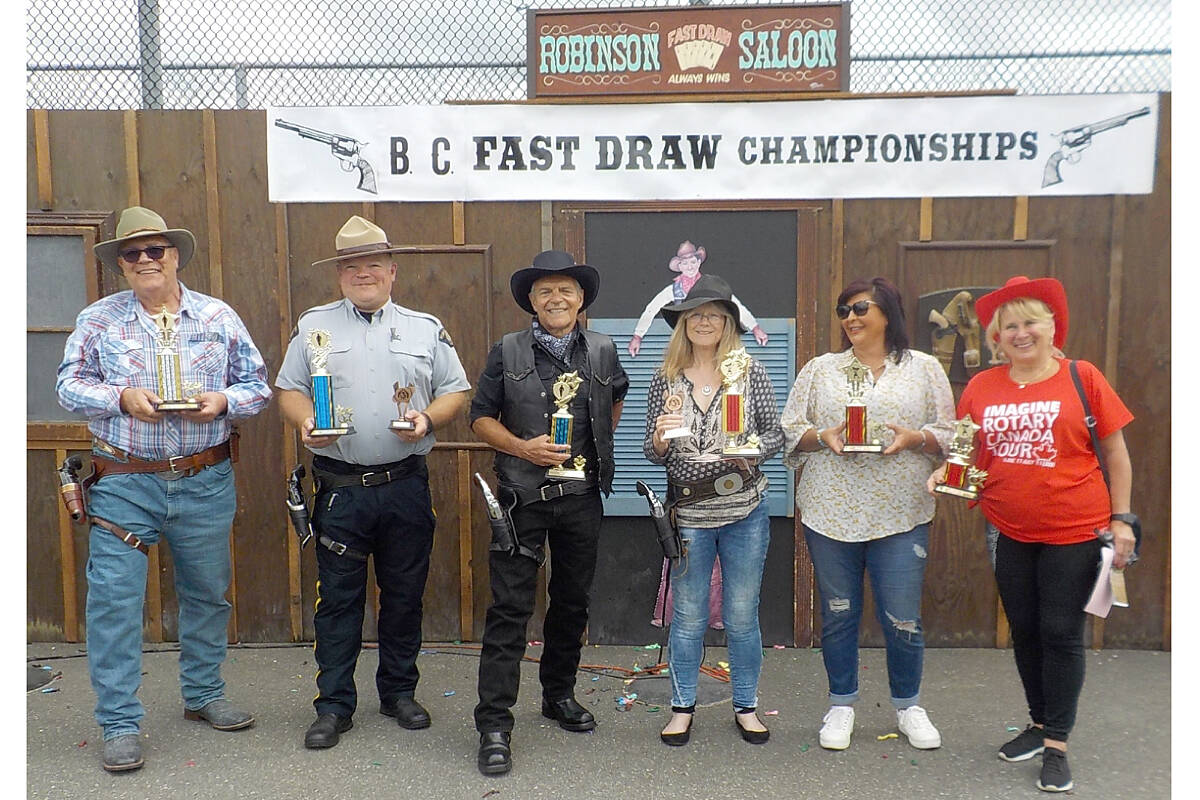 Winners of the celebrity shootout at the Aldergrove fair on Saturday, July 16 (from left): Rudy Storteboom, third men聮s shootout Phil Colter, 91原创 RCMP, 2nd men聮s, Eric Storteboom, winner, Women聮s winner Karen Long, president B.C. Farm Museum, 91原创 City Mayor Val van den Broek, second place, and Jayne Pilot president, Aldergrove Rotary, third woman. (Special to 91原创 Advance Times)