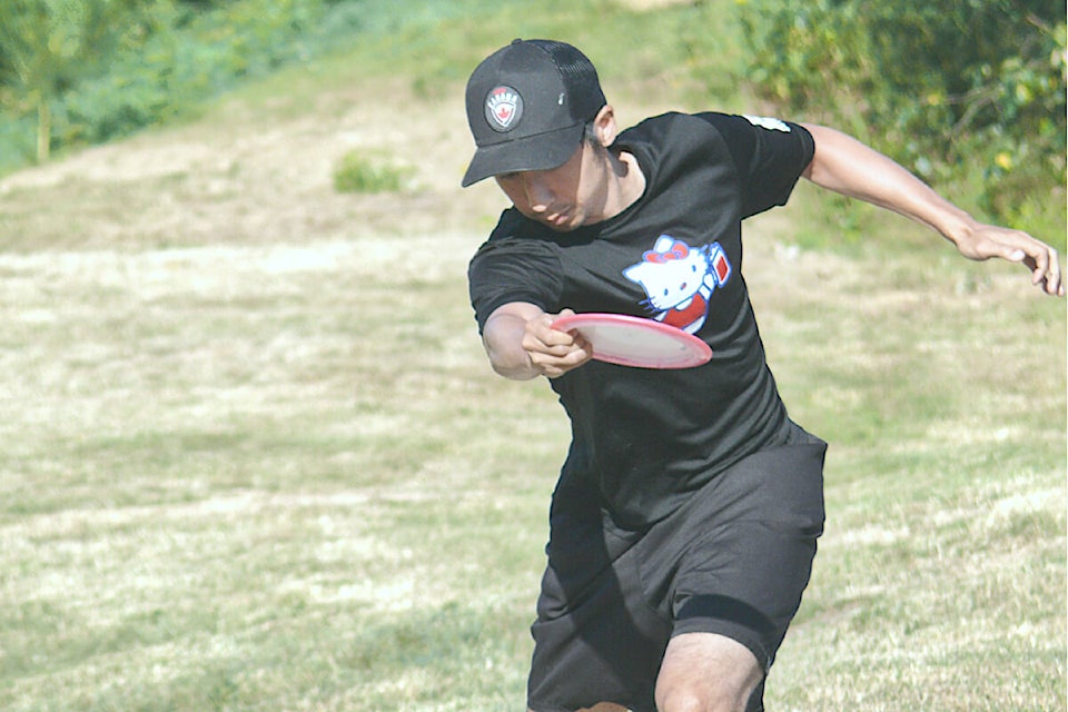 A competitor winds up at the B.C. Open at Raptors Knoll disc golf course in Aldergrove on Sunday, July 24th. The event, the largest of its kind in Canada, drew competitors from across the country and the U.S. (Dan Ferguson/Langley Advance Times)