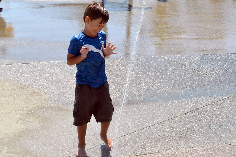 Milo Zuriti and his cousins are visiting their grandmother in South Surrey from Okanagan to get some relief from rising temperature. That included a visit to the Willoughby spray park Wednesday, July 27, 2022. (Tanmay Ahluwalia/91ԭ Advance Times)