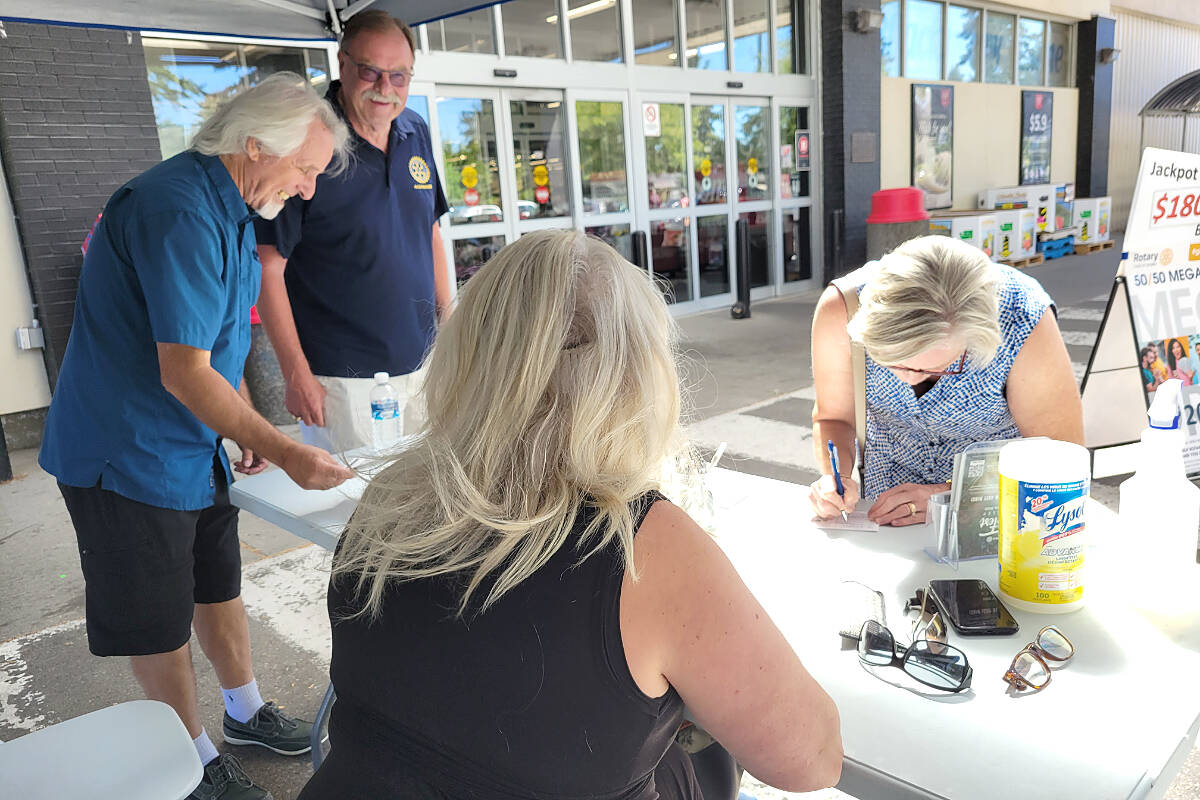 On Sunday, Aug. 7, Rotary Clubs of 91原创 volunteers were at the Otter Co-op to promote RibFest and sell 50-50 tickets for the Mega draw that raises money for local charities. As of that morning, the total jackpot was nearing $180,000, with the winner getting half. (Dan Ferguson/91原创 Advance Times)
