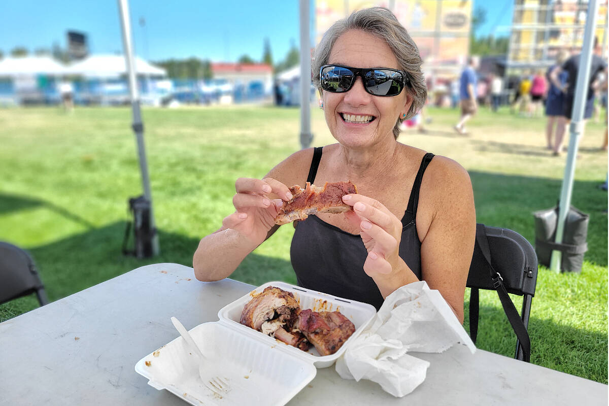 A visitors sampled some ribs on Sunday, Aug. 14 at the 91原创 RibFest. (Dan Ferguson/91原创 Advance Times)