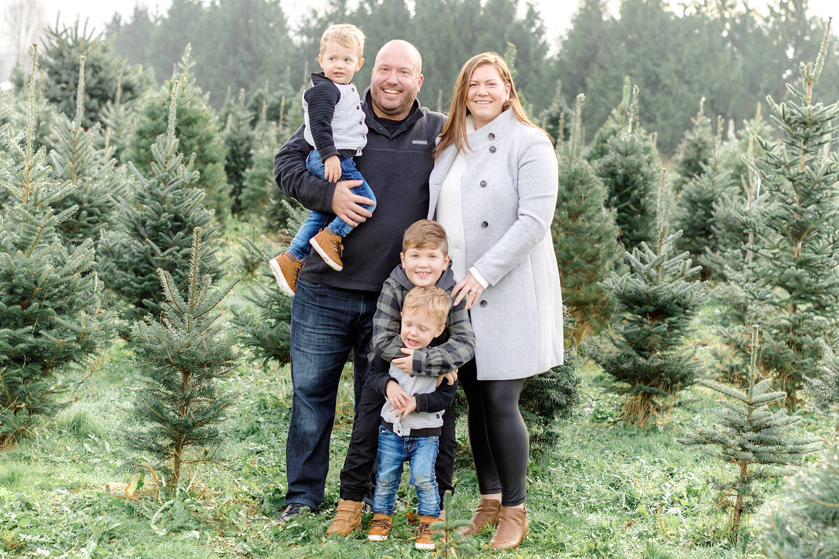 The Openshaw family of Murrayville, Mike and Alisha, with their three boys, identical twins Weston (being held by dad) and Bennett, 3, being hugged by older brother Jackson. Weston and Bennett have both been diagnosed with leukemia. (GoFundMe)