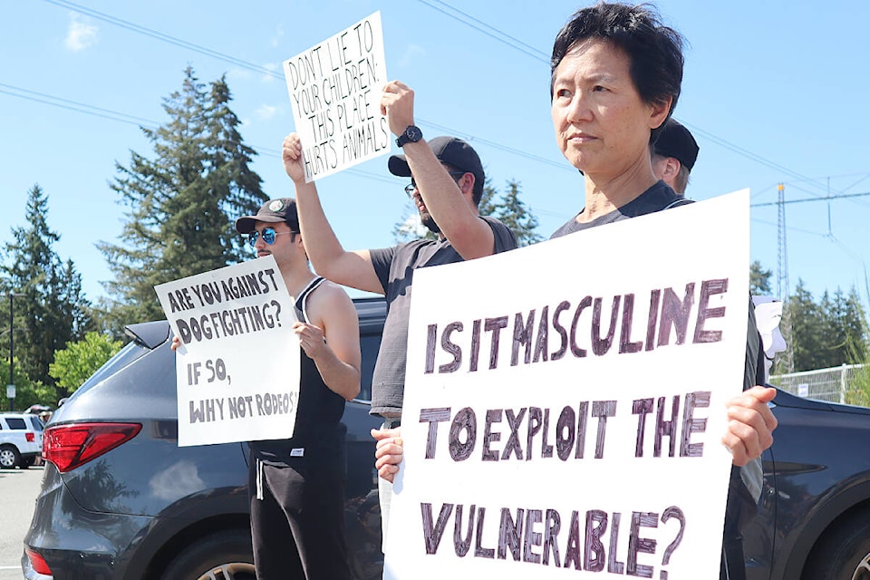 Animal rights activists protested Saturday outside the Valley West Stampede rodeo in Langley. (Tanmay Ahluwalia/Langley Advance Times)