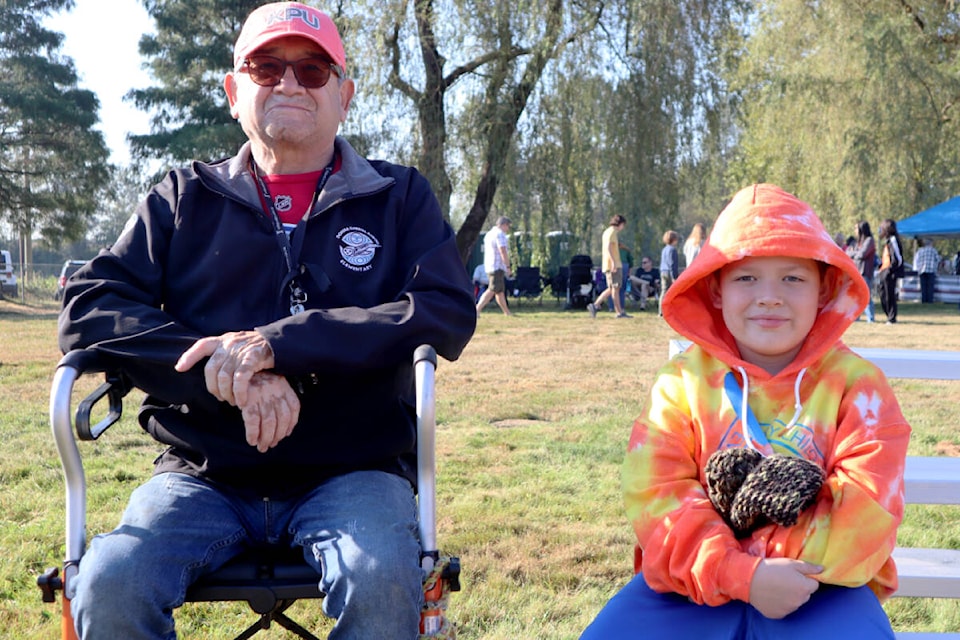Brandon Gabriel’s dad and nephew, too attended the first-ever Kwantlen First Nation Salmon and Cranberry Harvest Celebration. (Tanmay Ahluwalia/Langley Advance Times)